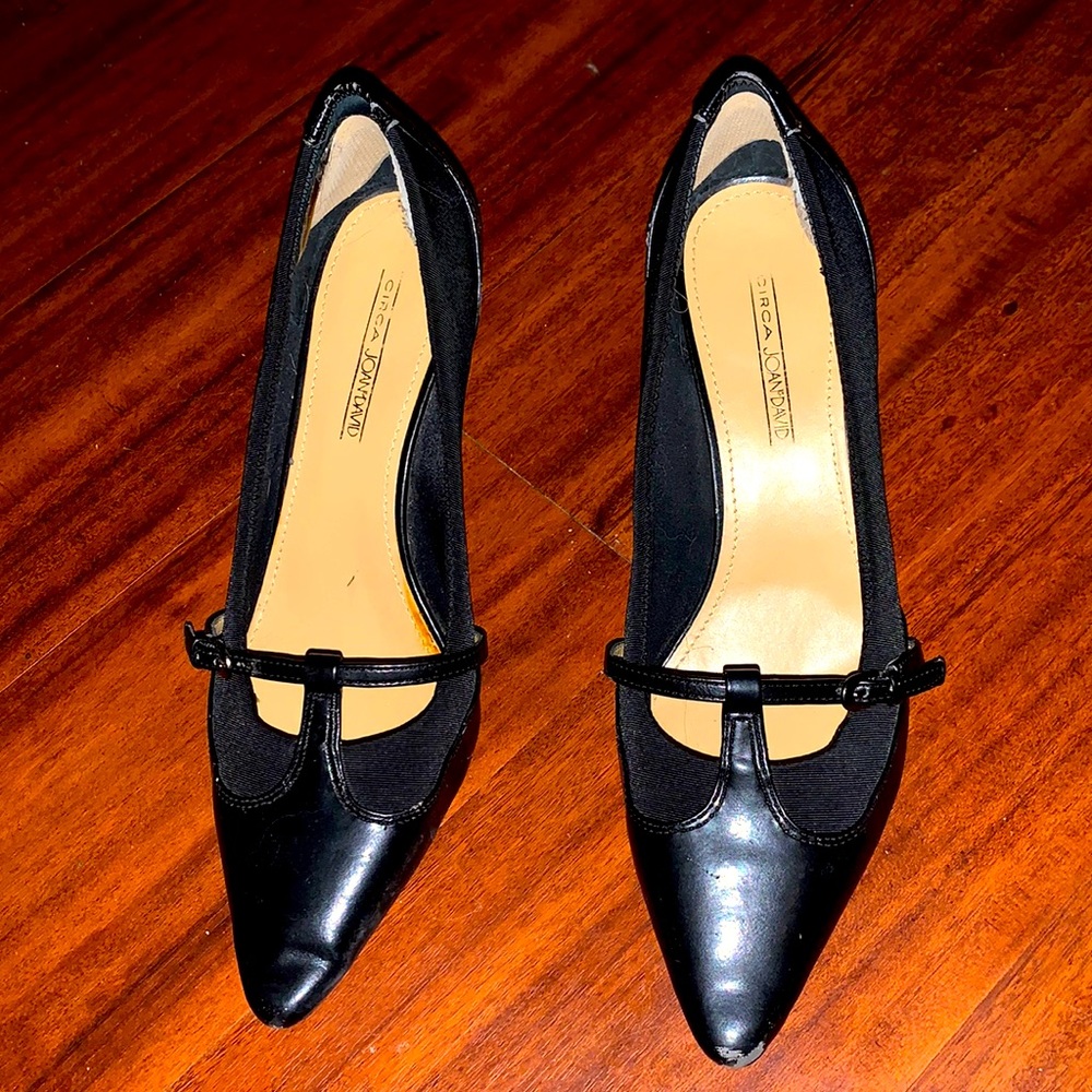 Joan & David leather pumps with low front strap and slim gold buckle. Low heel.